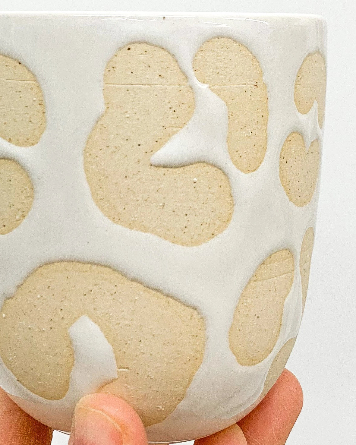 Handmade Ceramic Drinking Cup in White Animal Print from Mima Ceramics by Michelle Organ