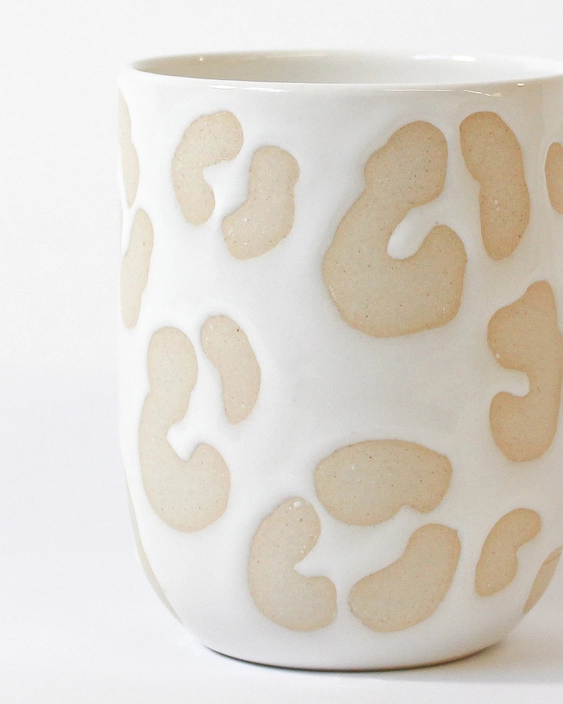 Handmade Ceramic Mug in White Animal Print from Mima Ceramics by Michelle Organ