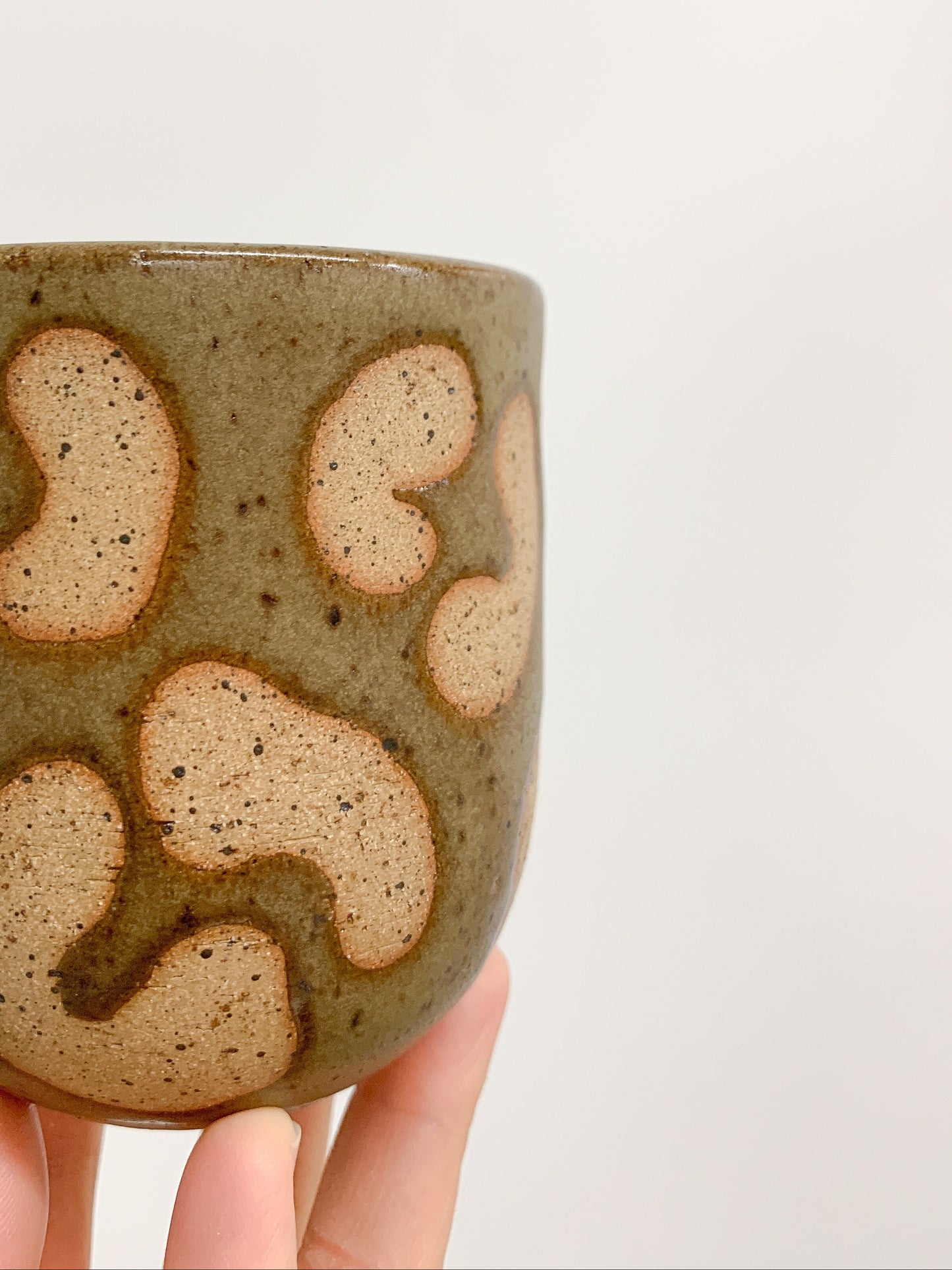 Handmade Ceramic Drinking Cup in Olive Green Animal Print from Mima Ceramics by Michelle Organ