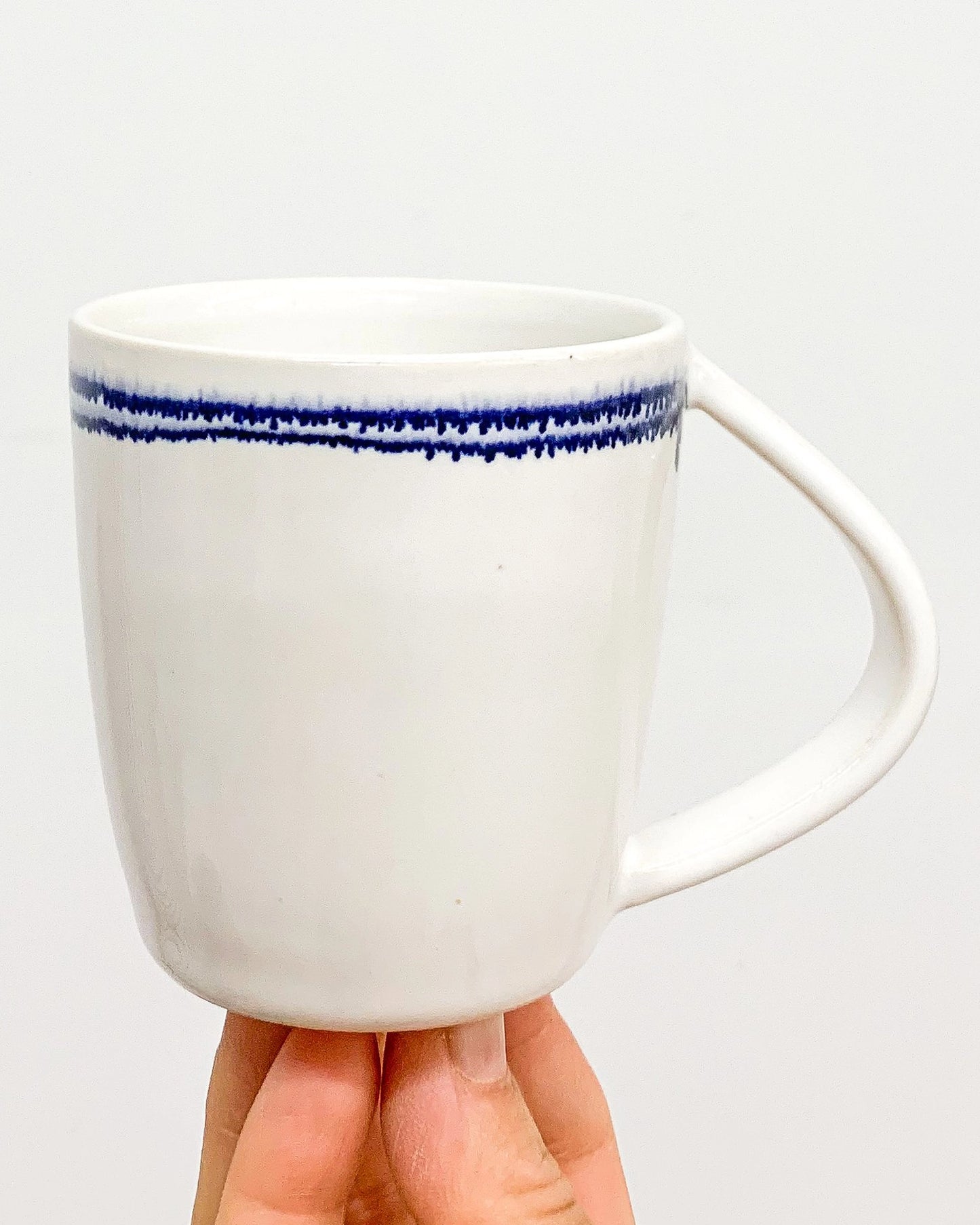 Handmade Short Ceramic Mug in White with Blue Stripe from Mima Ceramics by Michelle Organ