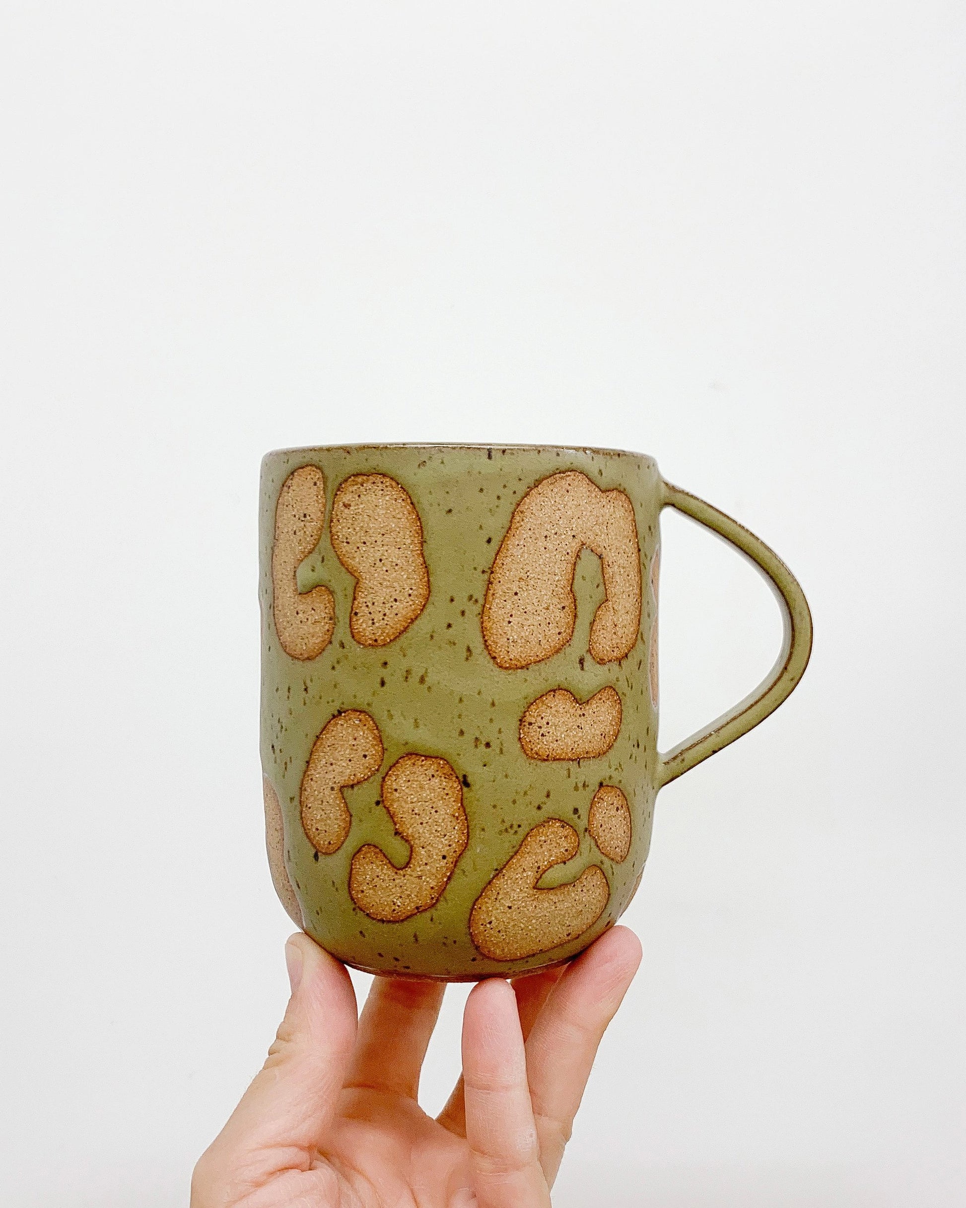Handmade Ceramic Mug in Olive Animal Print from Mima Ceramics by Michelle Organ