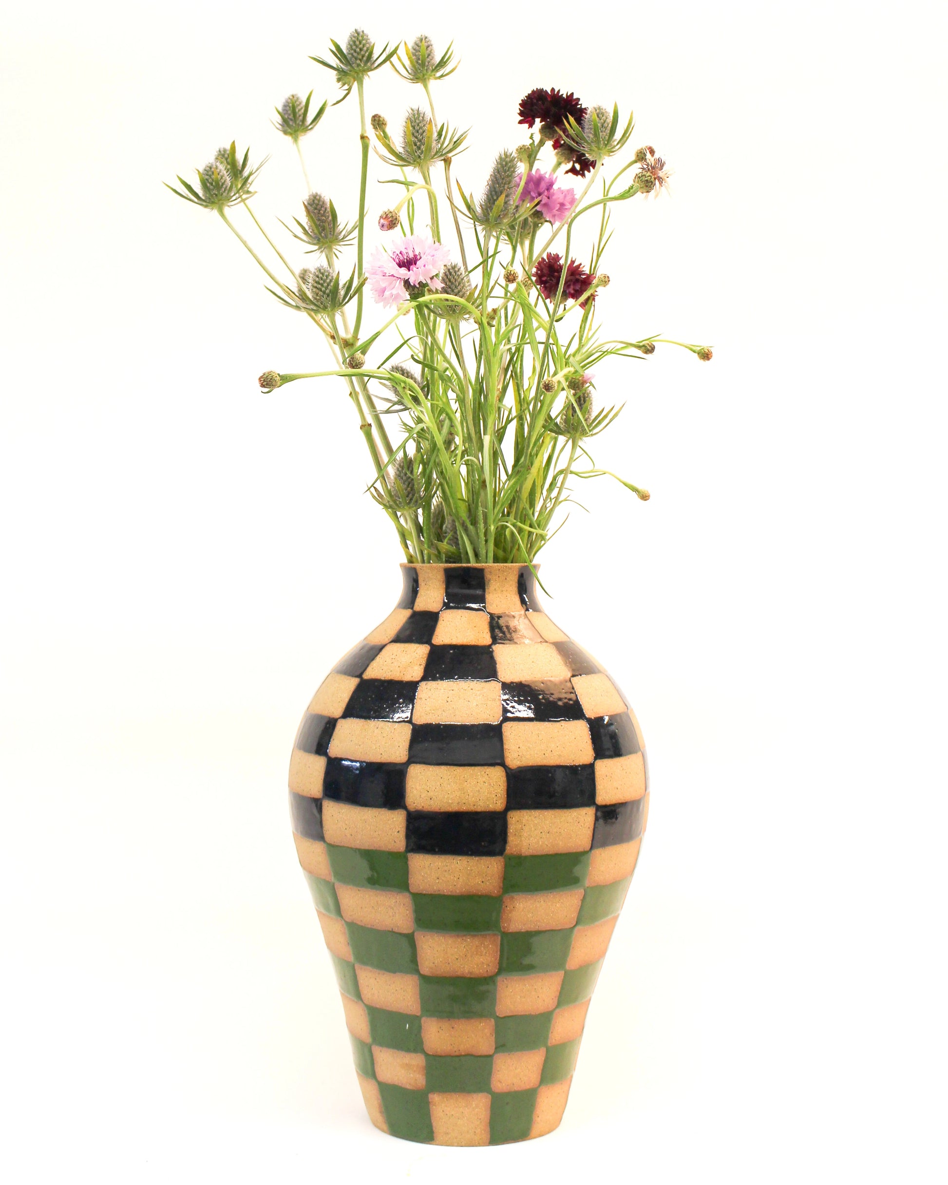Handmade Blue and Green Checkered Ceramic vase with flowers on a white background from Mima Ceramics by Michelle Organ.  
