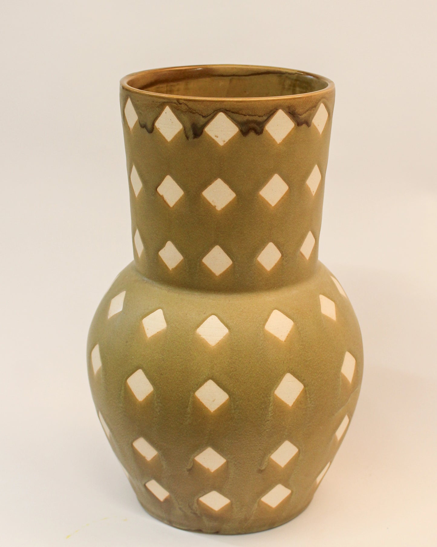 Handmade Olive Green ceramic vase with diamond pattern on a white background from Mima Ceramics by Michelle Organ.