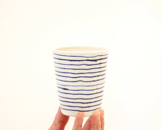 Handmade White Ceramic Drinking Cup with multiple thin blue lines from Mima Ceramics by Michelle Organ.