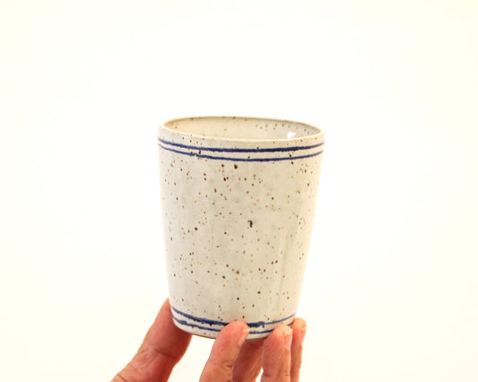 Handmade White Speckled Ceramic Drinking Cup with thin blue lines from Mima Ceramics by Michelle Organ.